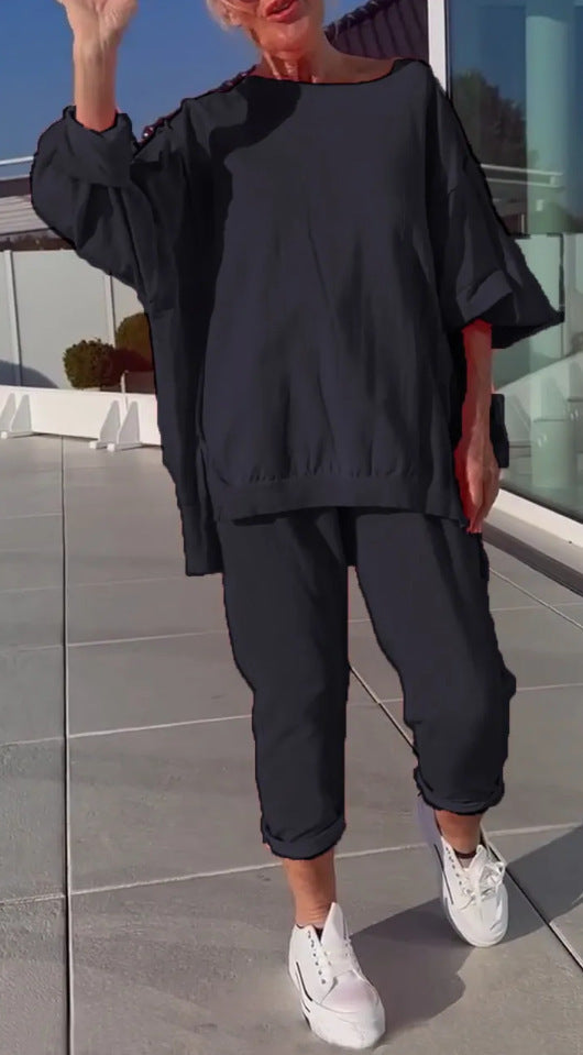 Sena | Rundhalsausschnitt mit Schlitz. Fluoreszierender Freizeitanzug für Damen