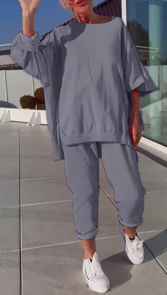 Sena | Rundhalsausschnitt mit Schlitz. Fluoreszierender Freizeitanzug für Damen