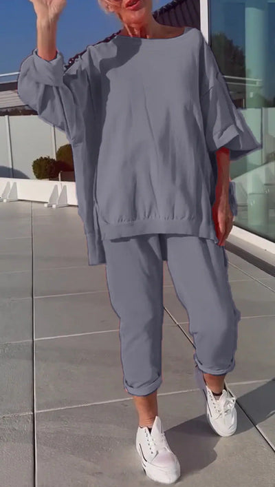 Sena | Rundhalsausschnitt mit Schlitz. Fluoreszierender Freizeitanzug für Damen