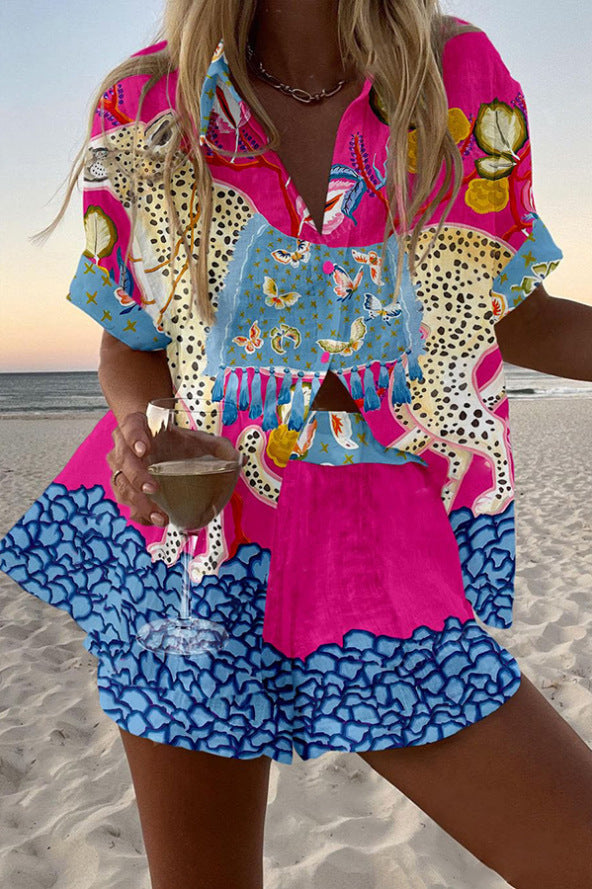 Belina  | Kurzer Leinenoverall mit Schmetterlingsdruck