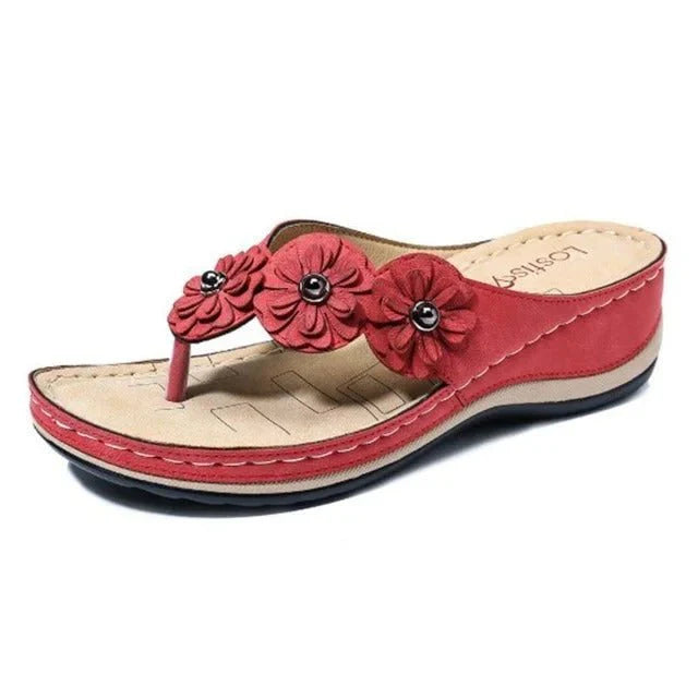 Carmela – Elegante Blumen Wedge Sandalen