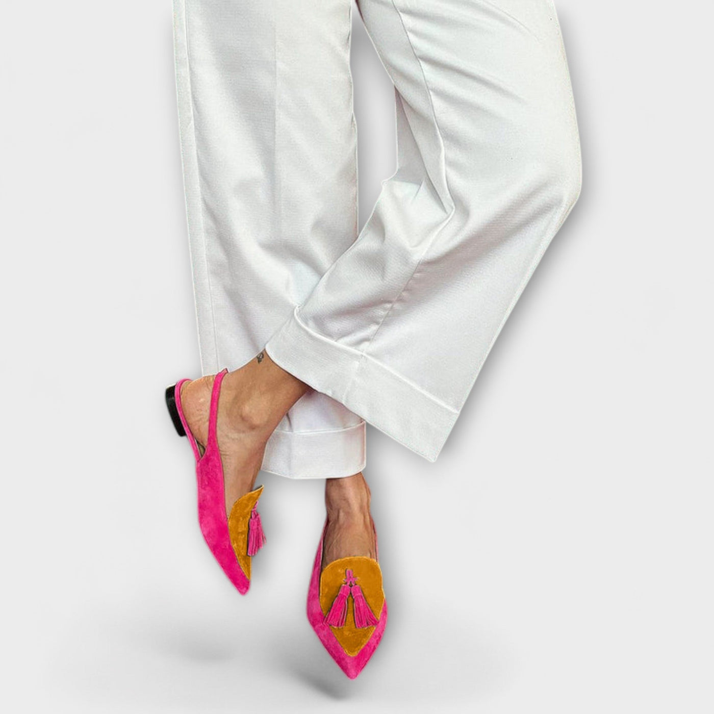 Frendessa – Farbspiel mit Quasten-Design