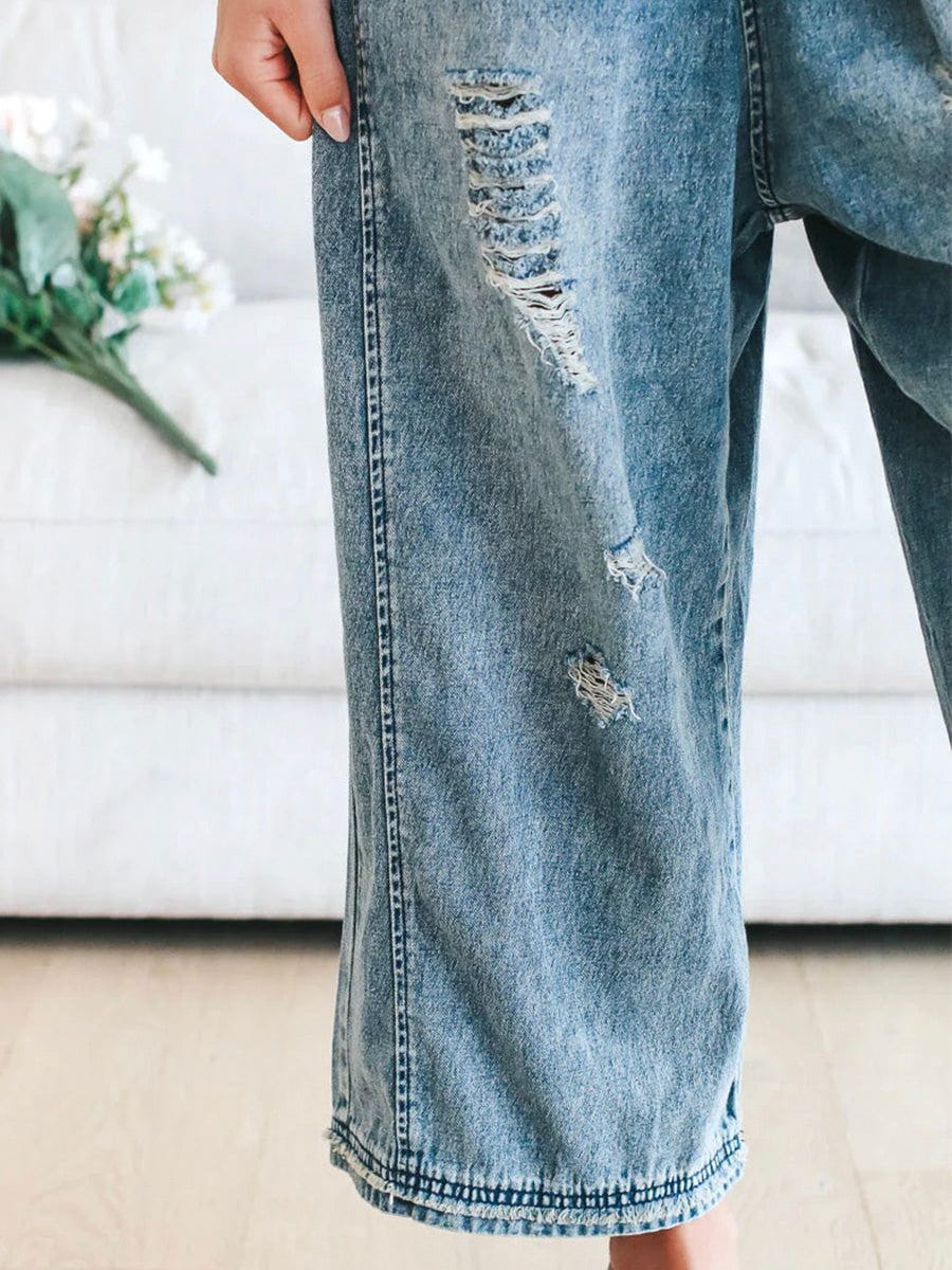 Weite Latzhose aus Jeans | Used-Effekt | Lässiger Vintage-Stil