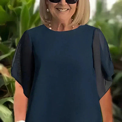 Josiah | Silhouette des eleganten asymmetrischen Tops und der weiten Hose