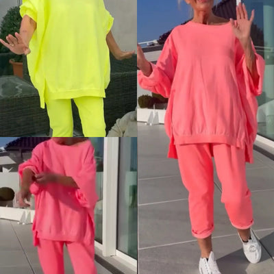 Sena | Rundhalsausschnitt mit Schlitz. Fluoreszierender Freizeitanzug für Damen