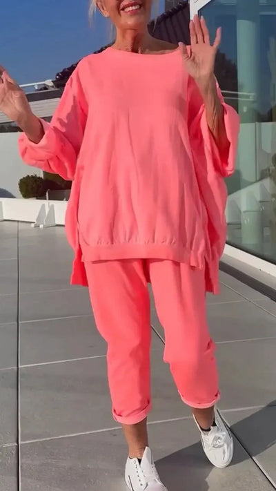 Sena | Rundhalsausschnitt mit Schlitz. Fluoreszierender Freizeitanzug für Damen